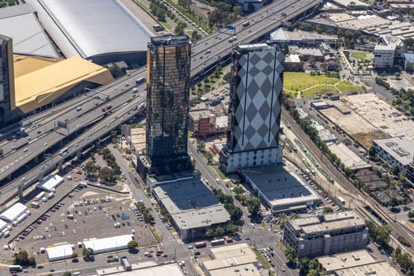 Aerial view of high-rise towers on Normanby Road in Southbank beside the West Gate Freeway and the Melbourne Convention and Exhibition Centre.