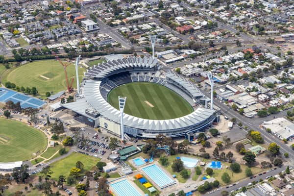 Aerial view of GMHBA Stadium within Kardinia Park in South Geelong, showing the oval, grandstands, light towers, surrounding streets, sports fields and Kardinia Aquatic Centre pools.