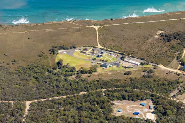 Aerial view of Anglesea Water Reclamation Plant near the coastline and coastal scrub at Anglesea, Victoria.