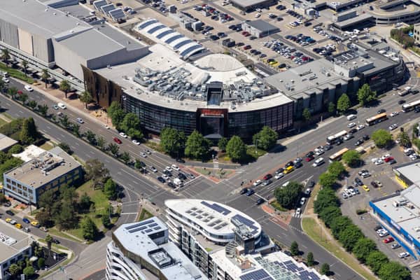 Aerial view of Westfield Doncaster at the intersection of Doncaster Road and Williamsons Road in Doncaster VIC, with traffic, car parks and surrounding commercial buildings visible.